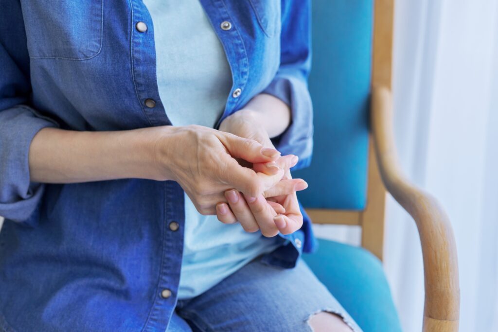 Body language, close-up of a woman's hand. Stress, nervousness, tension, anxiety, anxiety people concept